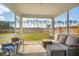 Inviting screened-in porch featuring comfortable seating and scenic backyard views at 284 Shadybrook Dr, Summerville, SC 29486