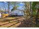 Spacious backyard with wooden deck and mature trees at 2925 Alabama Dr, North Charleston, SC 29405