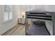 Bright bedroom with plantation shutters, and nice natural light, next to comfortable bunk beds at 2925 Alabama Dr, North Charleston, SC 29405