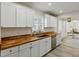 Bright kitchen featuring white cabinets and butcher block countertops with stainless steel appliances at 2925 Alabama Dr, North Charleston, SC 29405
