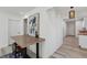 Open floor plan featuring dining area with modern art and convenient access to the kitchen at 2925 Alabama Dr, North Charleston, SC 29405