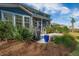 Home backyard featuring a grill, garden and outdoor lighting at 306 Long Pier St, Summerville, SC 29486