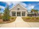 The exterior of the community clubhouse features a welcoming entrance and well-maintained landscaping at 306 Long Pier St, Summerville, SC 29486