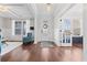Elegant foyer with hardwood floors, coffered ceilings, and stylish decor, offering a grand entrance at 306 Long Pier St, Summerville, SC 29486