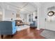 Bright living room with coffered ceilings, hardwood floors, and stylish furnishings, perfect for relaxing at 306 Long Pier St, Summerville, SC 29486