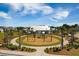 A vibrant community playground with swings, slides, and play equipment at 306 Long Pier St, Summerville, SC 29486