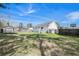 Expansive backyard with a well-maintained lawn, deck, and various recreational amenities for outdoor enjoyment at 3075 Old Highway 52, Moncks Corner, SC 29461