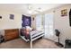 Bright bedroom featuring a ceiling fan, natural light, and personalized decor for a fun, playful atmosphere at 3075 Old Highway 52, Moncks Corner, SC 29461
