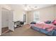 Cozy bedroom with natural light, a ceiling fan, and comfortable decor creates a relaxed and inviting space at 3075 Old Highway 52, Moncks Corner, SC 29461