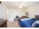 Comfortable bedroom features a ceiling fan, natural light, and classic decor for a cozy and inviting space at 3075 Old Highway 52, Moncks Corner, SC 29461