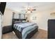 Cozy bedroom featuring a large bed, ceiling fan, and neutral decor for a relaxing retreat at 3075 Old Highway 52, Moncks Corner, SC 29461