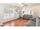 Bright living area with hardwood floors and natural light, creating an inviting space at 3075 Old Highway 52, Moncks Corner, SC 29461