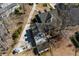 Aerial view highlighting this home's expansive backyard, deck, large trees, and convenient outbuildings at 318 Archibald Dr, Goose Creek, SC 29445