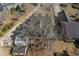 Areal view of a beautiful home, showcasing the backyard, deck, mature trees and the surrounding neighborhood at 318 Archibald Dr, Goose Creek, SC 29445