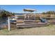 Private boat dock with a pontoon boat offering direct water access for recreational activities at 318 Archibald Dr, Goose Creek, SC 29445