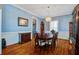 Traditional dining room with hardwood floors and an elegant chandelier, ready for Gathering gatherings at 318 Archibald Dr, Goose Creek, SC 29445