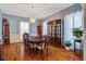 Elegant dining room featuring hardwood floors, a chandelier, and a classic china cabinet at 318 Archibald Dr, Goose Creek, SC 29445