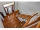 Spacious foyer boasts hardwood floors, staircase, and natural light from the front door at 318 Archibald Dr, Goose Creek, SC 29445