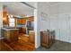 Well-equipped kitchen with granite countertops, stainless steel appliances, custom cabinets, and wood floors at 318 Archibald Dr, Goose Creek, SC 29445