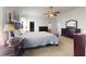 Warm main bedroom showcases neutral carpet, ample closet space, and access to an en-suite bath at 318 Archibald Dr, Goose Creek, SC 29445