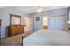 Light-filled main bedroom with a dresser, closet, and ensuite bathroom, providing convenience and functionality at 318 Archibald Dr, Goose Creek, SC 29445