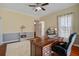 Charming home office with plush rug, lots of natural light, and views of the neighborhood at 318 Archibald Dr, Goose Creek, SC 29445