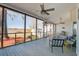 Inviting screened porch with comfortable seating and serene views of the water at 318 Archibald Dr, Goose Creek, SC 29445