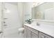 Clean and bright bathroom with a shower-tub, vanity with a stylish mirror, and modern fixtures at 332 Dahlia Row Dr, Summerville, SC 29486