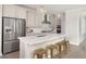 Contemporary kitchen featuring stainless steel appliances, and a center island with seating at 332 Dahlia Row Dr, Summerville, SC 29486