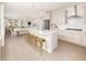 Bright, open floor plan with a modern kitchen, dining area, and comfortable living space at 332 Dahlia Row Dr, Summerville, SC 29486