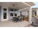 Cozy covered patio featuring an outdoor dining set, ideal for relaxation and entertaining at 332 Dahlia Row Dr, Summerville, SC 29486