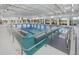 Indoor swimming pool with natural light and ramp access, perfect for recreation and exercise at 332 Dahlia Row Dr, Summerville, SC 29486