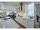 Modern kitchen design with white cabinets, stainless steel appliances and ample counter space at 3522 Habenaria Rd, Mount Pleasant, SC 29466