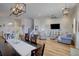 An open-concept space reveals seamless flow between the dining area, living room, and kitchen at 3522 Habenaria Rd, Mount Pleasant, SC 29466