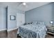 Inviting bedroom with hardwood floors, double closets, and a bed with a decorative comforter at 3537 Sewel Ave, Mount Pleasant, SC 29466