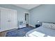 Serene bedroom with hardwood floors, large closet, and a soft blue rug at 3537 Sewel Ave, Mount Pleasant, SC 29466
