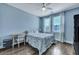 Comfortable bedroom with lots of natural light, a desk, hardwood floors, and stylish decor at 3537 Sewel Ave, Mount Pleasant, SC 29466