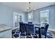 Bright dining room with views to other living areas, featuring French doors and stylish decor at 3537 Sewel Ave, Mount Pleasant, SC 29466