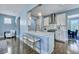 Modern kitchen with white cabinets, marble countertops, and stainless steel appliances at 3537 Sewel Ave, Mount Pleasant, SC 29466