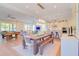 Open concept living space with pool table, kitchen, dining table, and lots of natural light at 4004 Flatiron Dr, Charleston, SC 29414