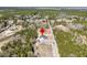 Aerial view featuring red pin over new construction home in a forest setting near coast at 4036 Azalea Farms Way, McClellanville, SC 29458