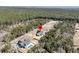 Aerial view of house in forest setting; new construction neighborhood with houses under construction at 4036 Azalea Farms Way, McClellanville, SC 29458
