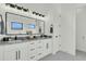 Bathroom with double sink vanity and black and white tile flooring at 4036 Azalea Farms Way, McClellanville, SC 29458