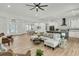 Expansive open layout showcasing the living room, dining area, and kitchen, perfect for entertaining at 4036 Azalea Farms Way, McClellanville, SC 29458