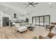 Bright, open-concept living space with a seamless transition to the modern kitchen at 4036 Azalea Farms Way, McClellanville, SC 29458