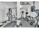 Home gym with various fitness equipment, including a weight machine, treadmill, and stationary bike at 4051 Colonel Vanderhorst Cir, Mount Pleasant, SC 29466