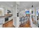 Bright kitchen with a large island, barstool seating, and modern appliances, creating an inviting space for cooking at 4051 Colonel Vanderhorst Cir, Mount Pleasant, SC 29466