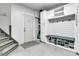 Well-organized mudroom with a bench, shoe storage, and white cabinets, located near the home's entrance at 4051 Colonel Vanderhorst Cir, Mount Pleasant, SC 29466
