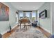 Inviting music room with large windows, a piano, and comfortable seating area at 4051 Colonel Vanderhorst Cir, Mount Pleasant, SC 29466