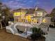 Expansive back of home featuring a multi-tiered deck, large windows, and serene outdoor living spaces at 4051 Colonel Vanderhorst Cir, Mount Pleasant, SC 29466
